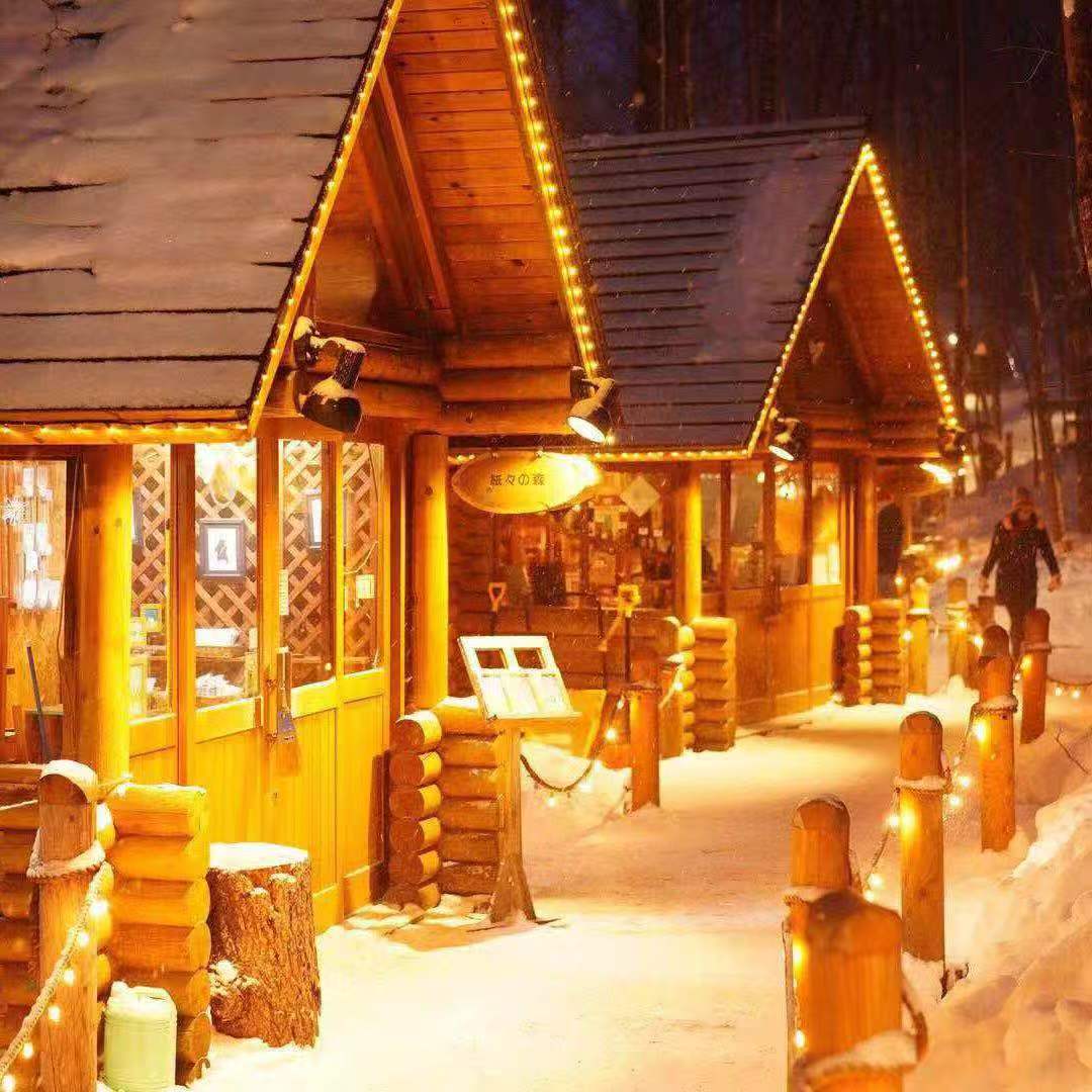北海道冬夜木屋灯光